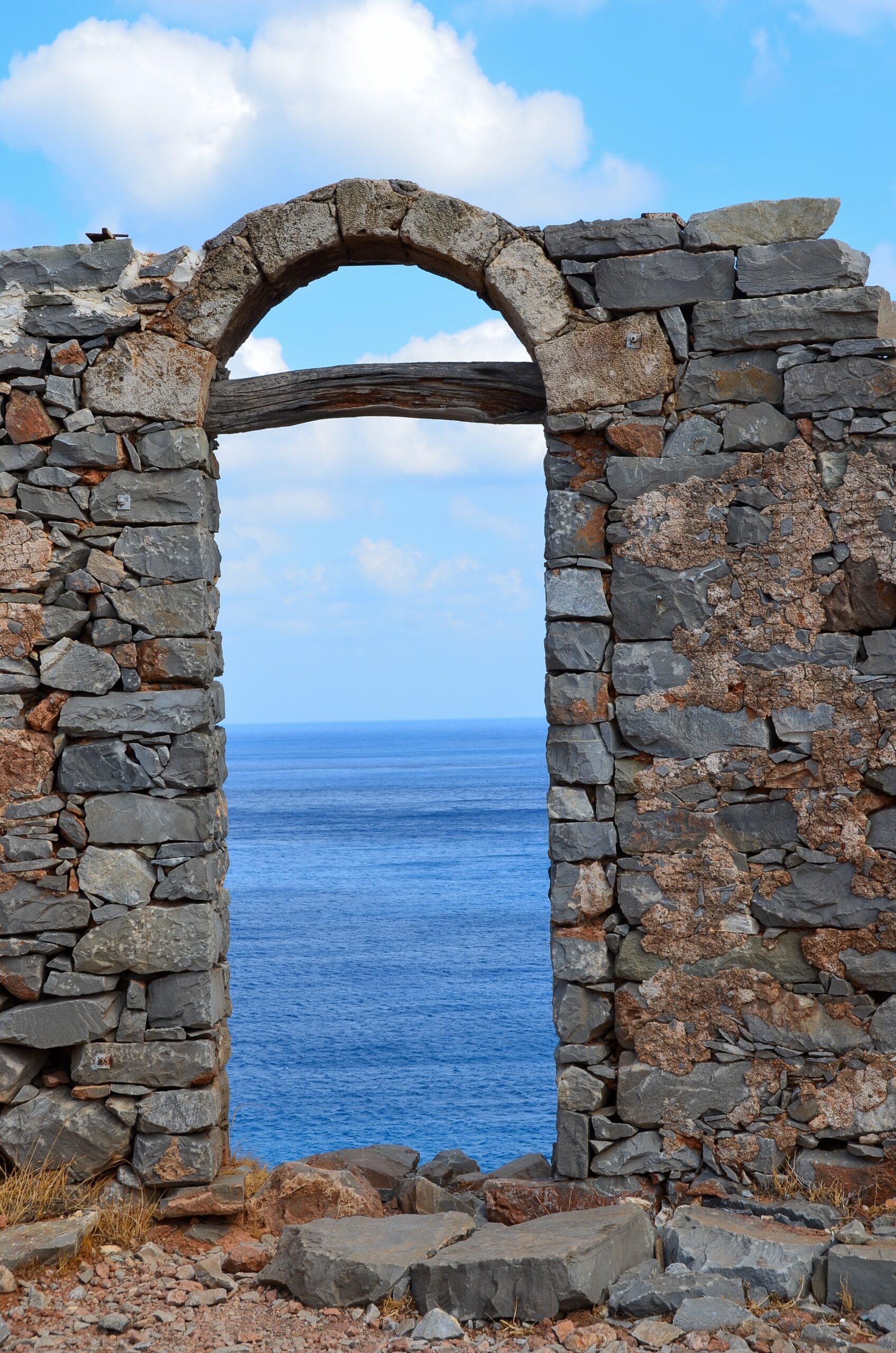 outside stone wall with entrance to the ocean