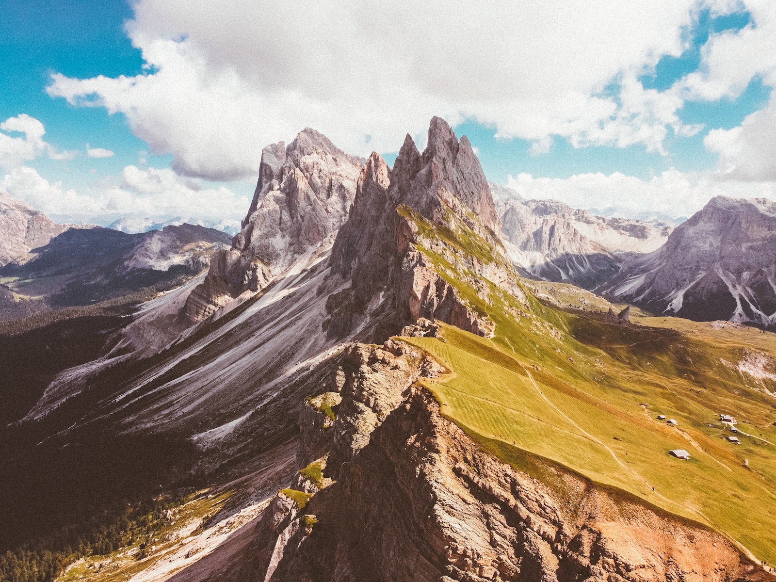 a rocky mountain with snow