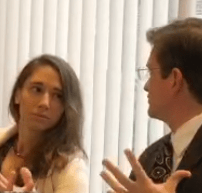 picture of two people, talking.