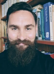 head shot of man with brown beard