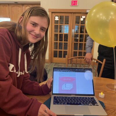 Florrie Hynds presents at the end of year gathering