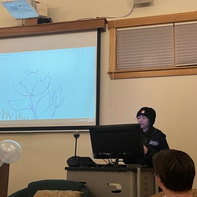 Cass Gordon presents at the end of year gathering