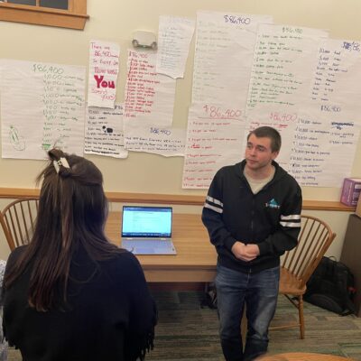 Derek Howanski presents at the end of year gathering