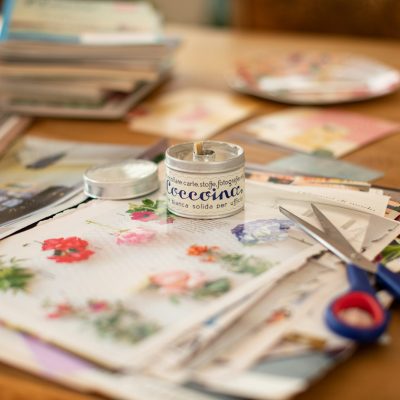 silver fork and knife on white and red floral table cloth