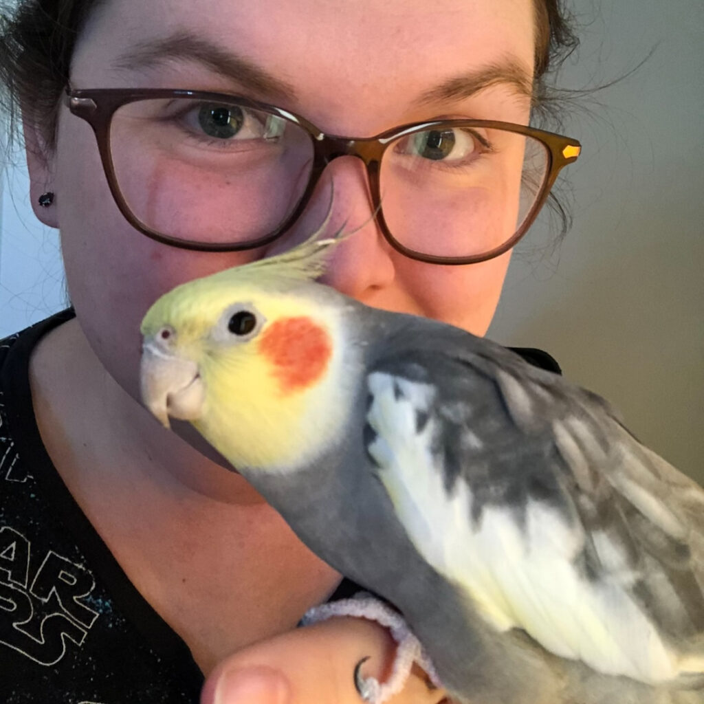 selfie of colab student affiliate megan with her pet bird